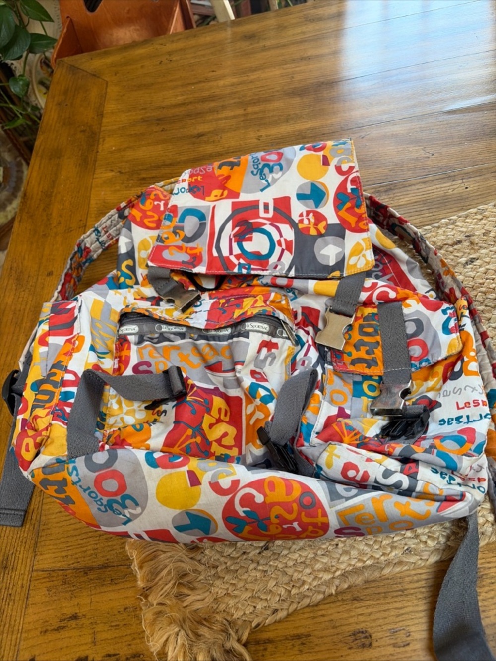 LeSportsac Multicolor Graphic Logo Backpack in Orange, Red, Blue, Gray